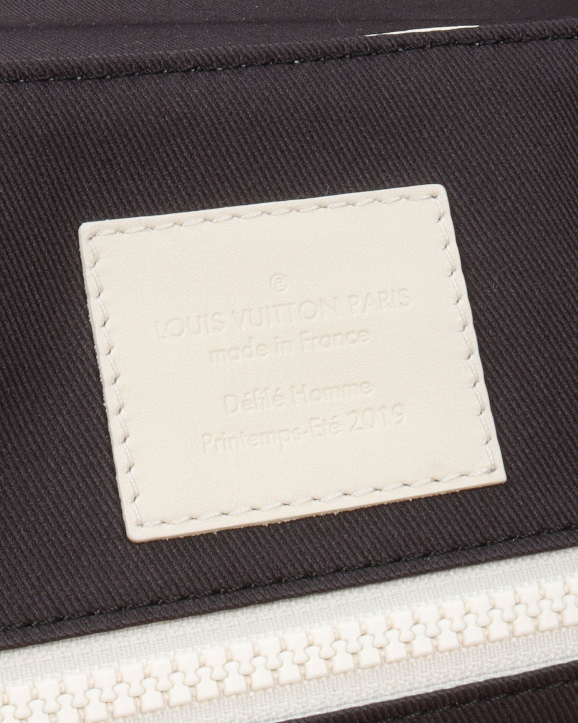 Embossed Monogram Leather Christopher Backpack