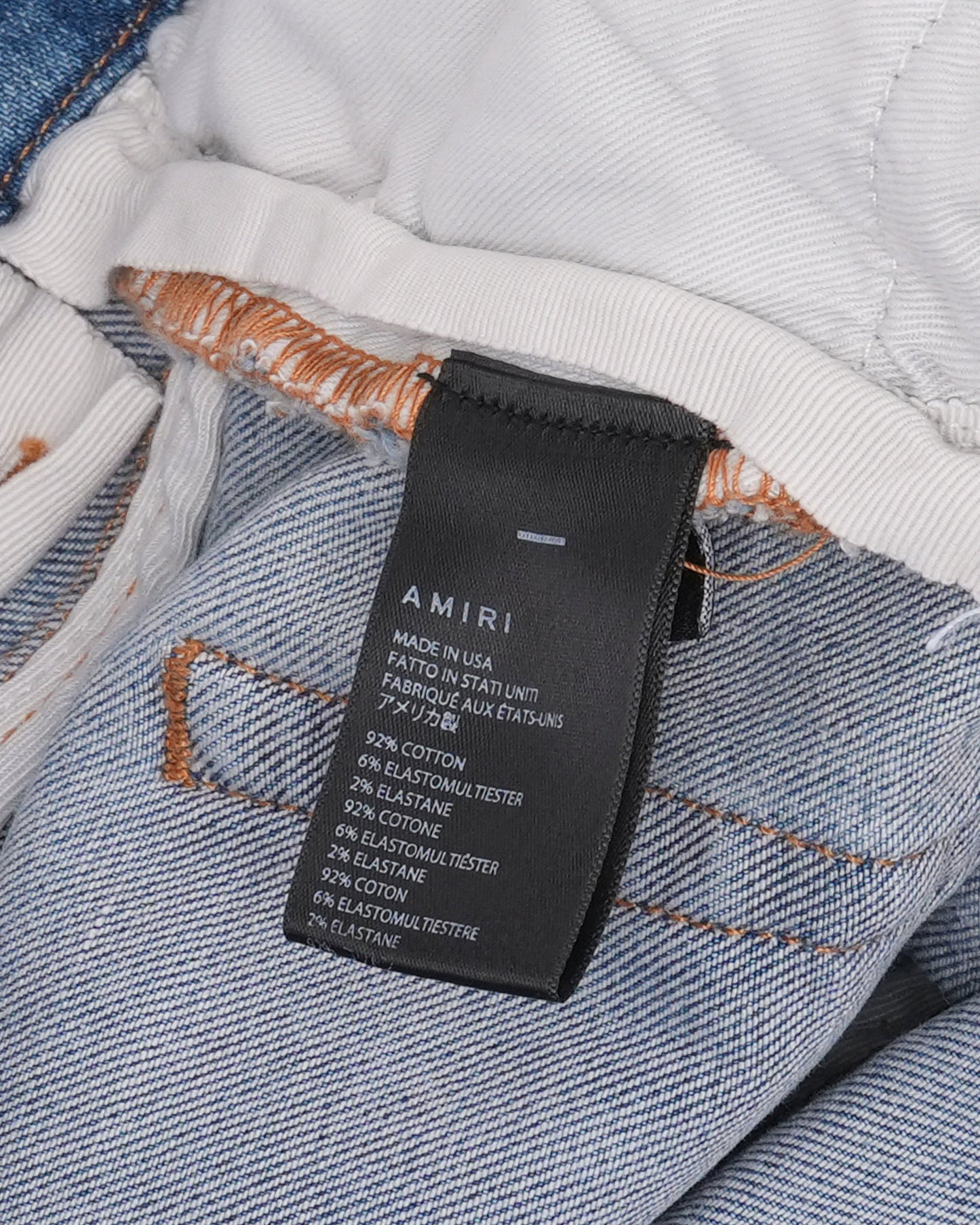 Distressed Repaired MX1 Jeans