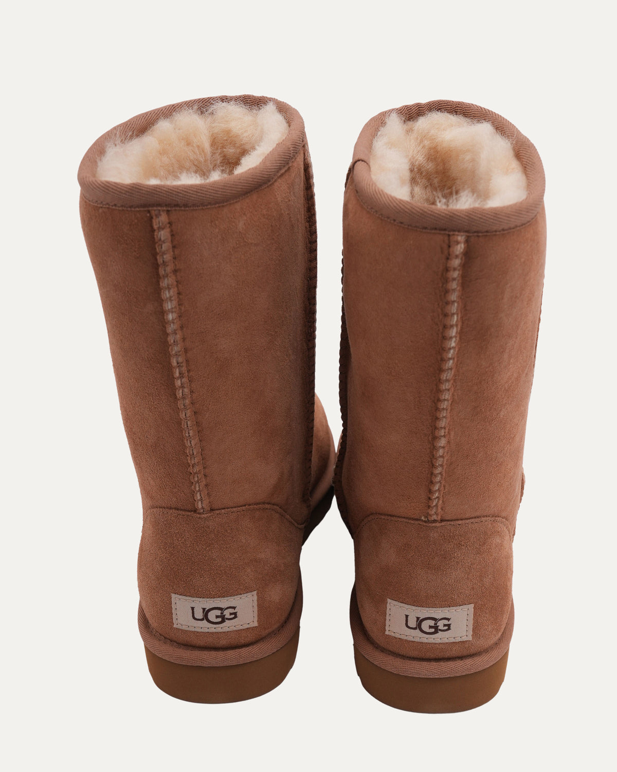 Cross Embellished Ugg Boots