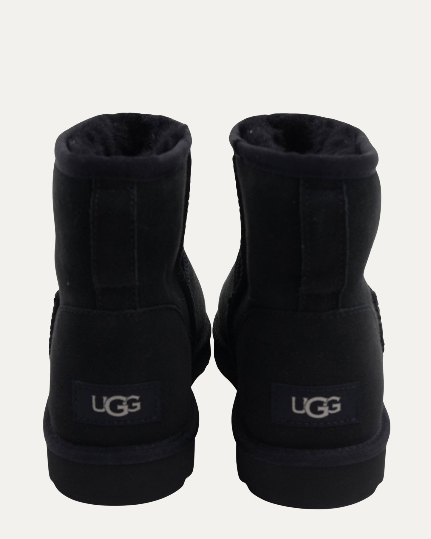Dagger Embellished Ugg Mini Boots