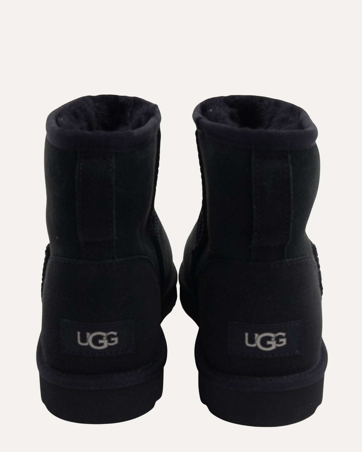 Dagger Embellished Ugg Mini Boots