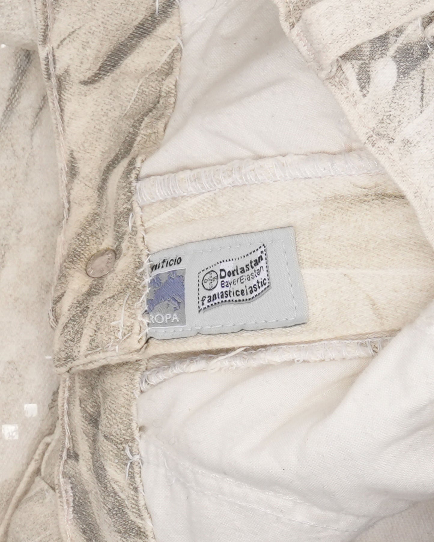 Feather Print Jeans With Transparent Shimmer