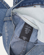 Distressed Slim Leg Jeans