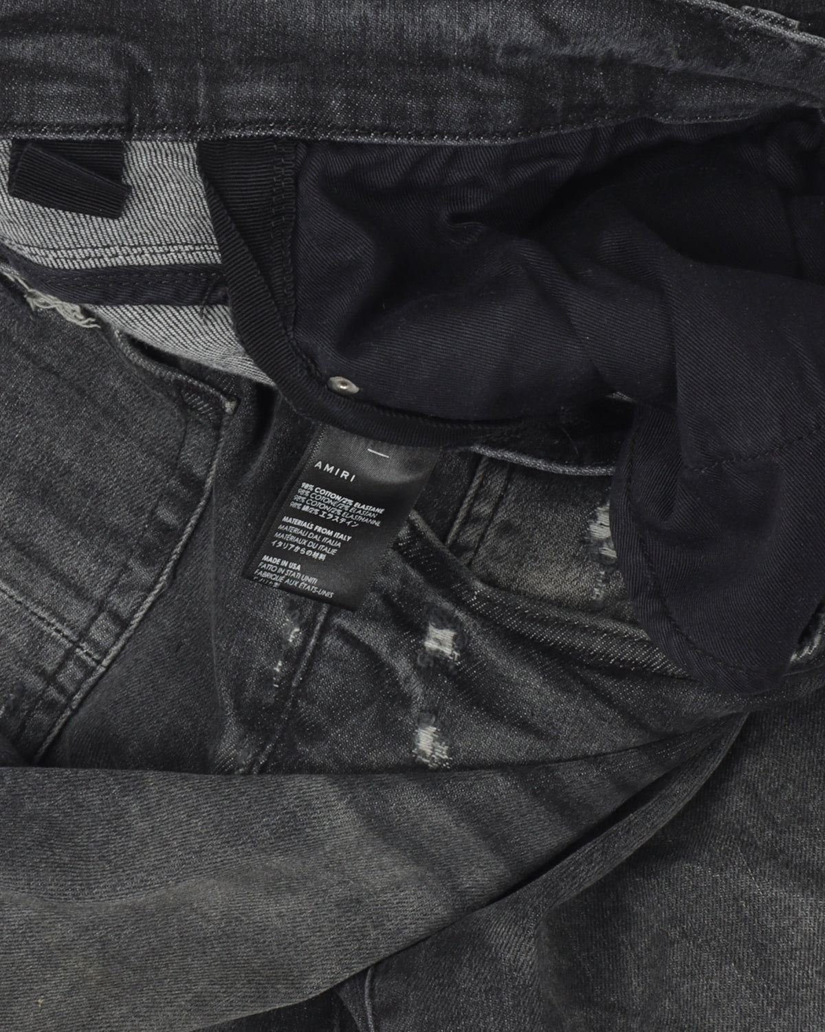 Lightly Distressed Faded Denim Jeans