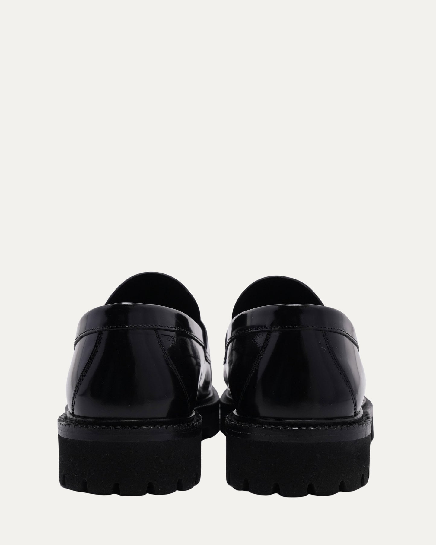 Debossed Monogram Patent Leather Loafers