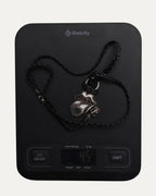 Rolling Stones Pendant on Braided Leather Necklace