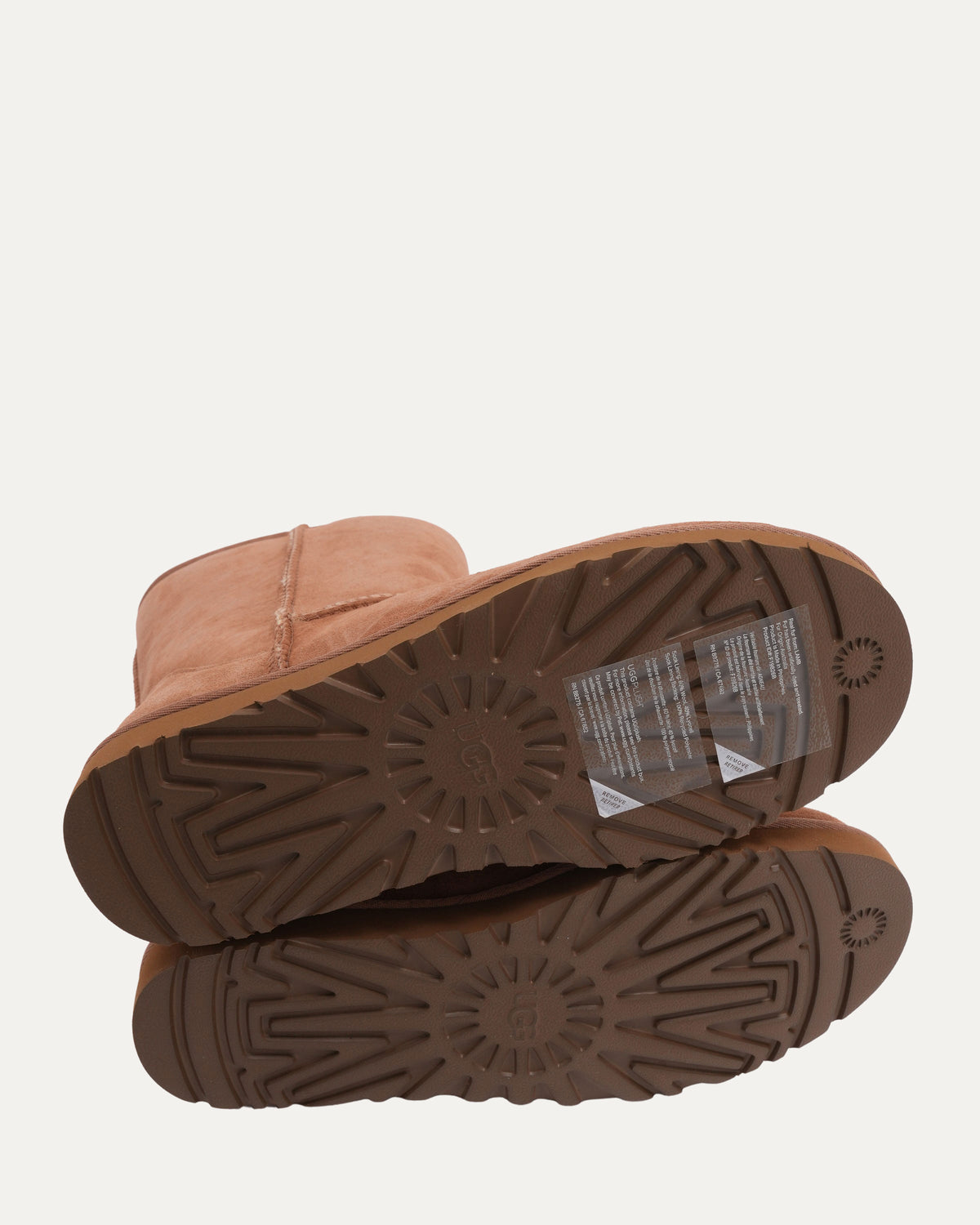 Cross Embellished Ugg Boots