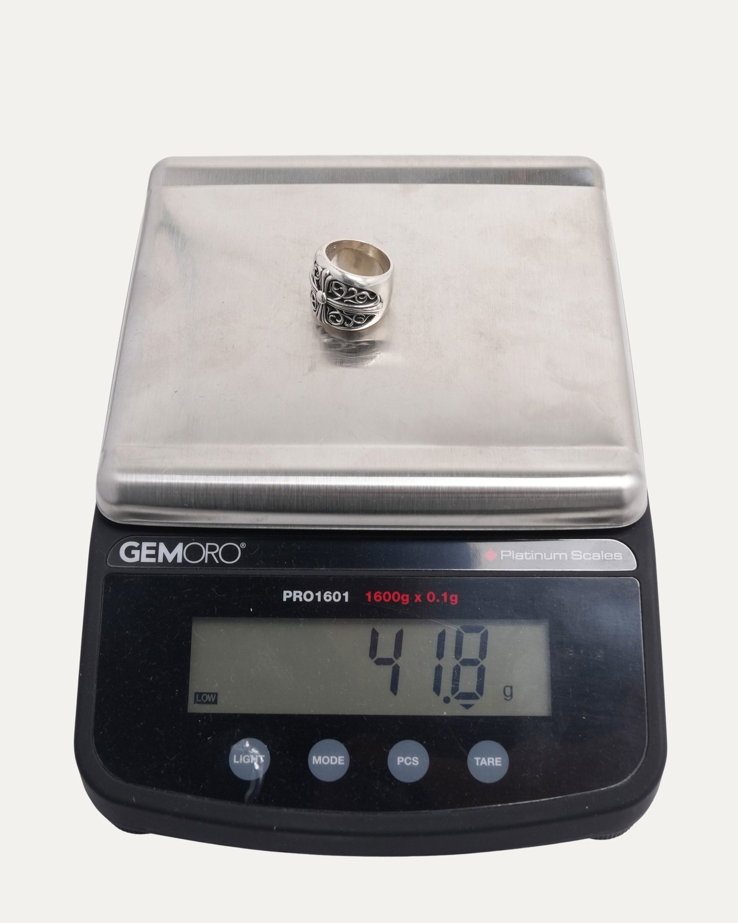Oval Cross Ring