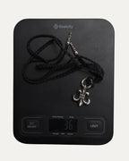 Fleur Pendant on Braided Leather Necklace
