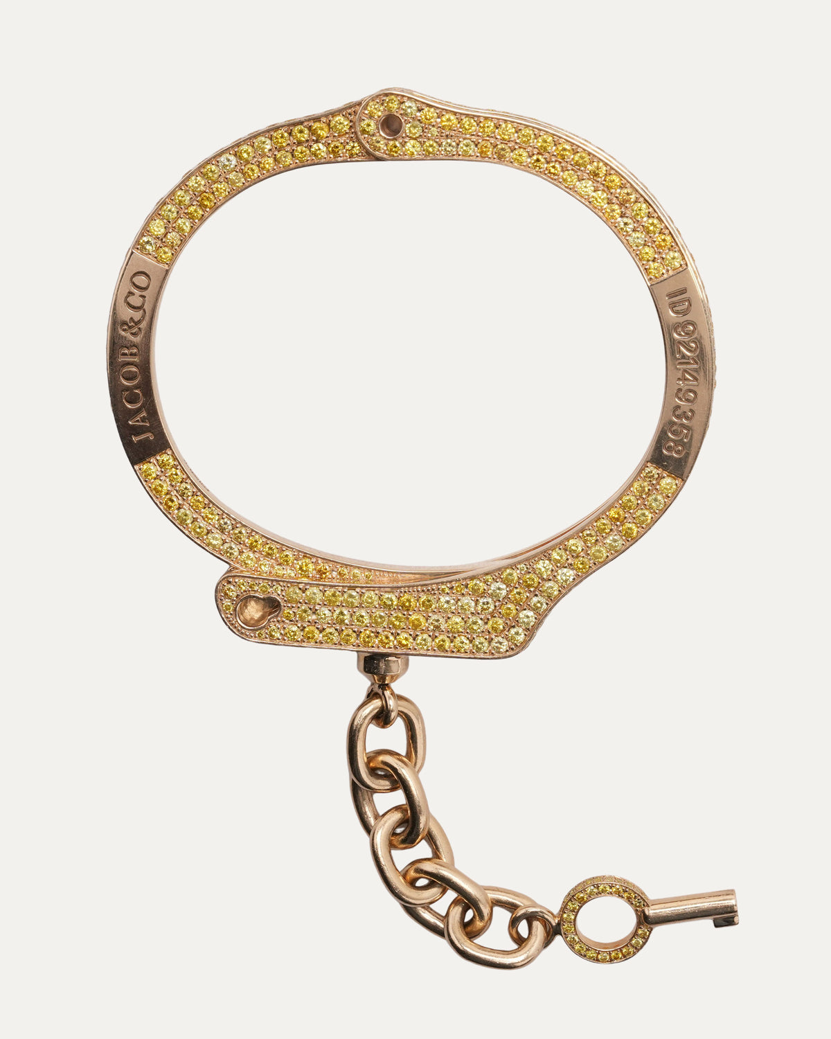 Pharrell's Gold and Yellow Diamond Handcuff Bracelet