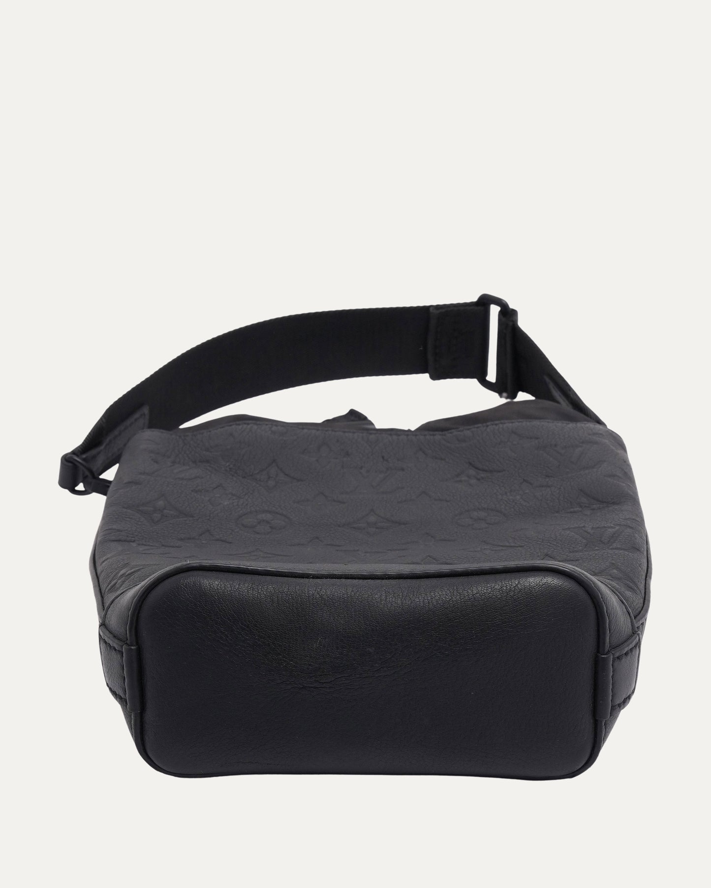 Debossed Monogram Noe Sling Bag