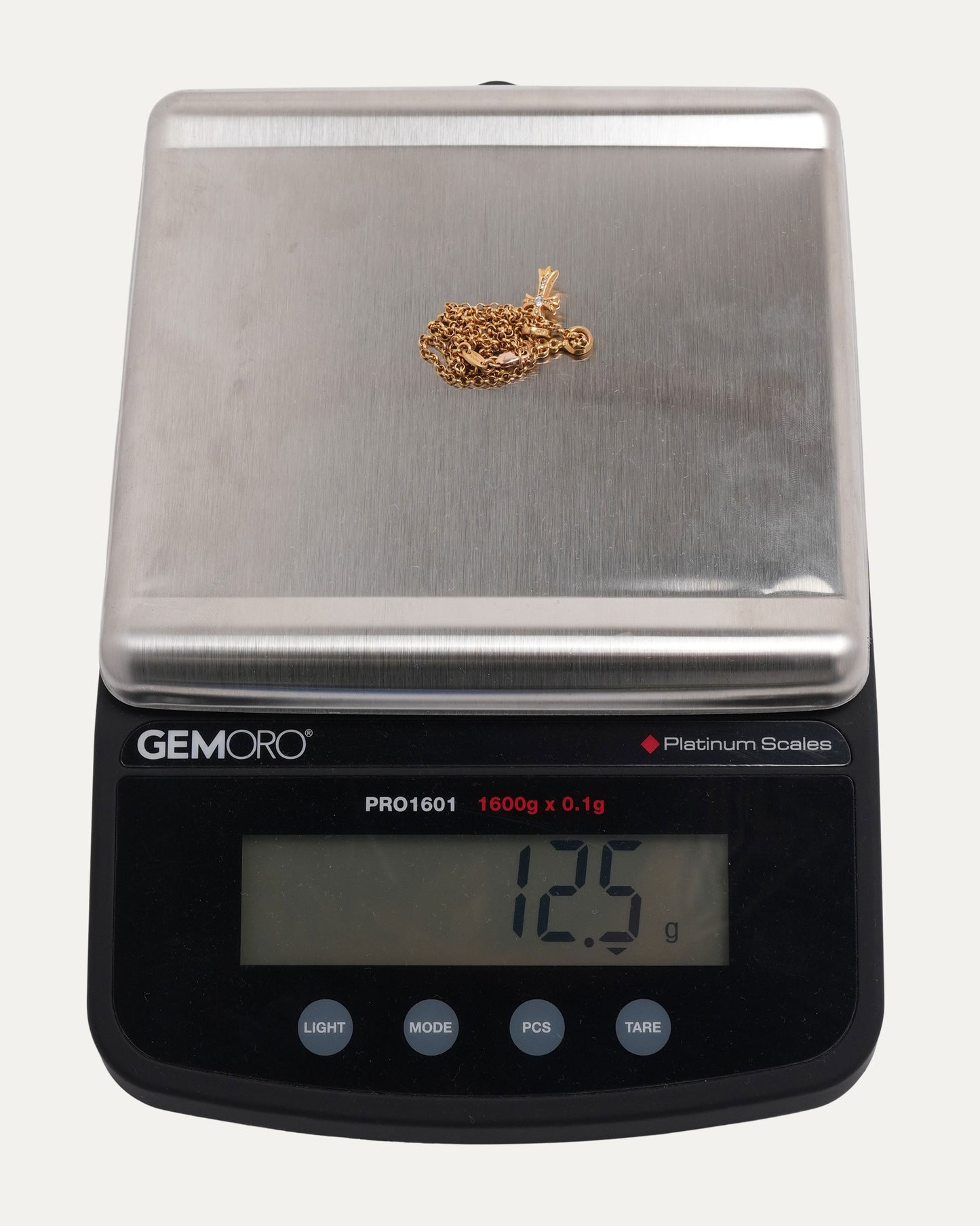 Gold Dagger and Diamond Baby Fat on Roll Chain