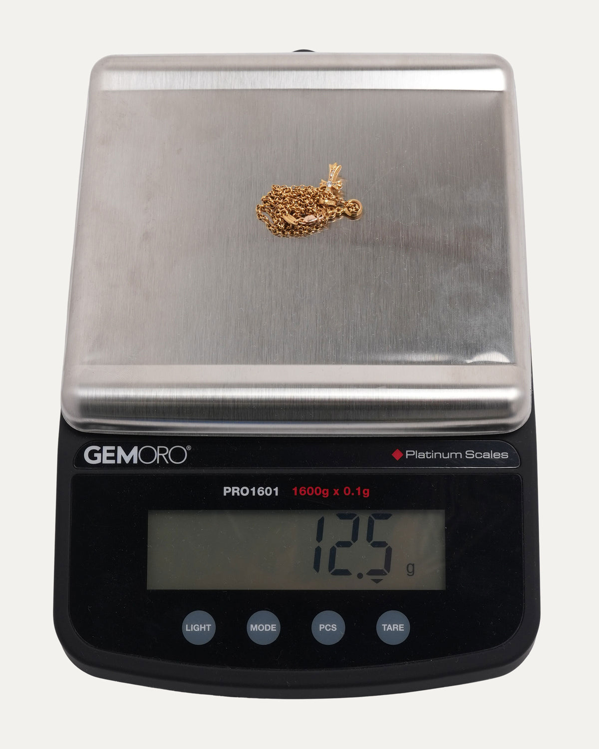 Gold Dagger and Diamond Baby Fat on Roll Chain