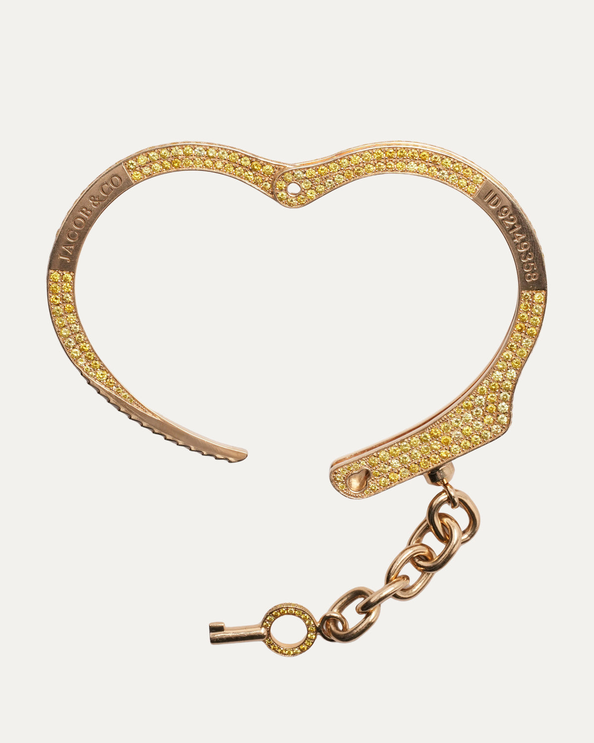 Pharrell's Gold and Yellow Diamond Handcuff Bracelet