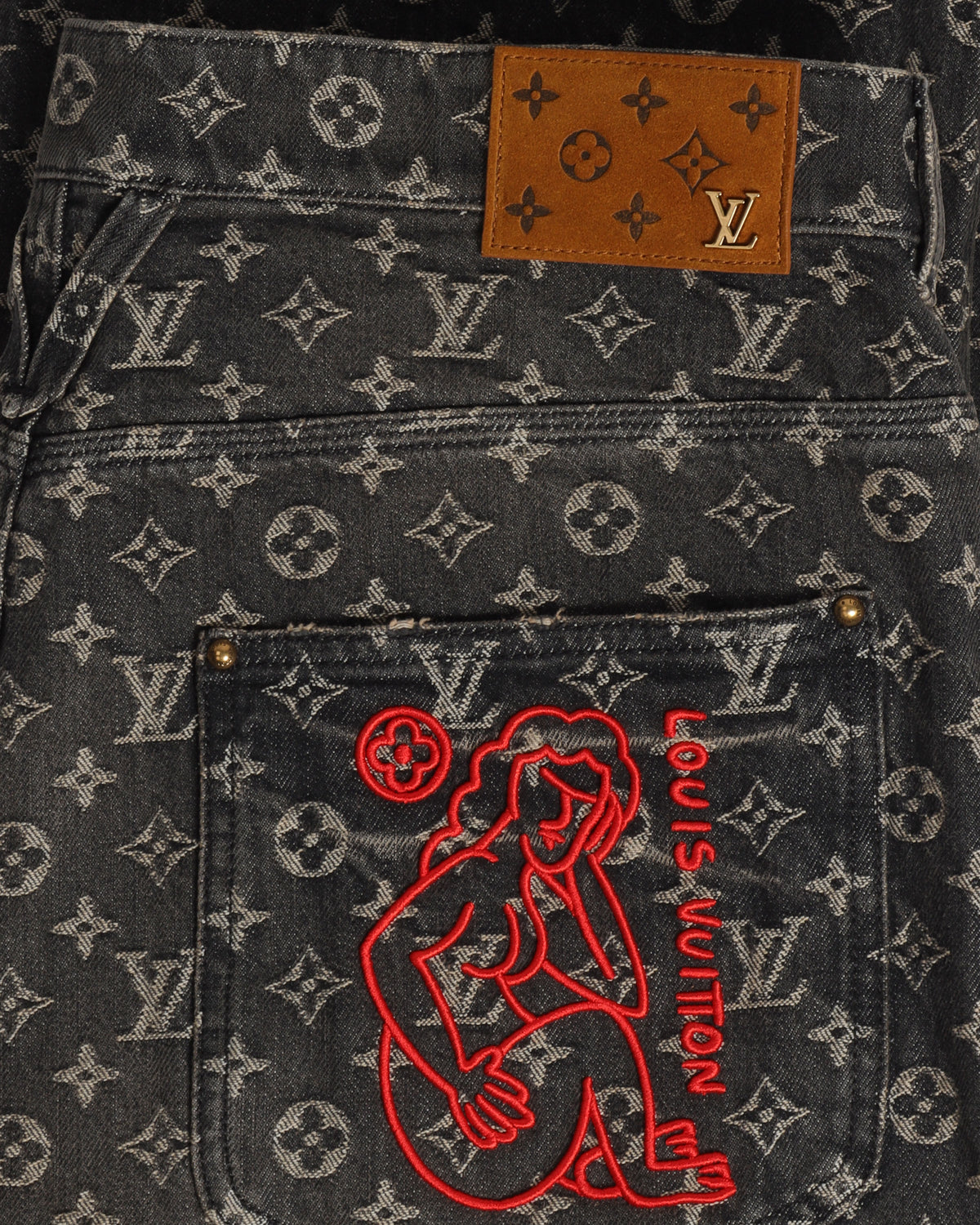 FW22 Distressed Baggy Monogram Jeans