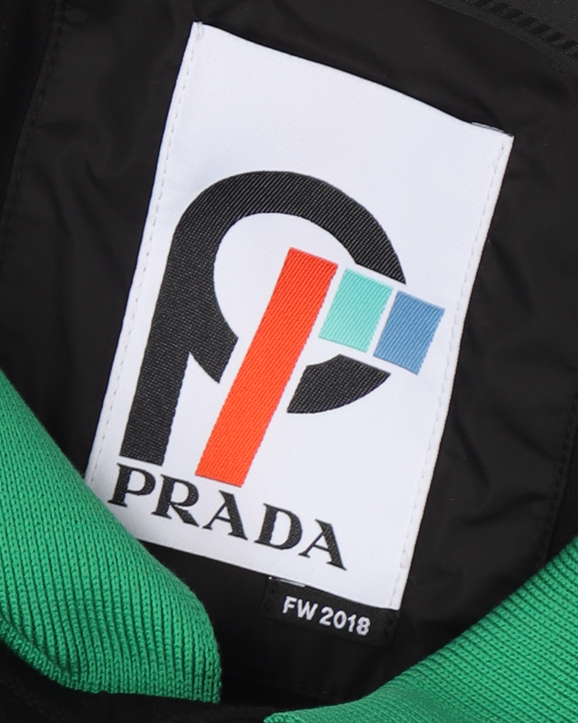 Prada sales rubber logo