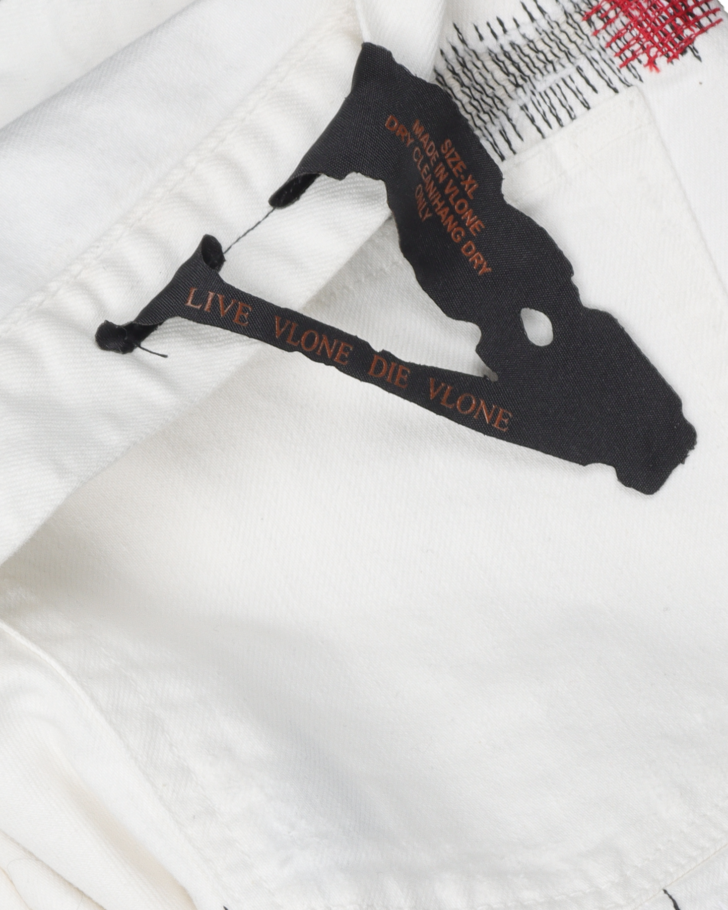 Distressed Repaired White Denim